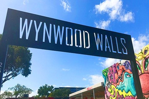 A stock photo. The entrance sign at Wynwood Walls.